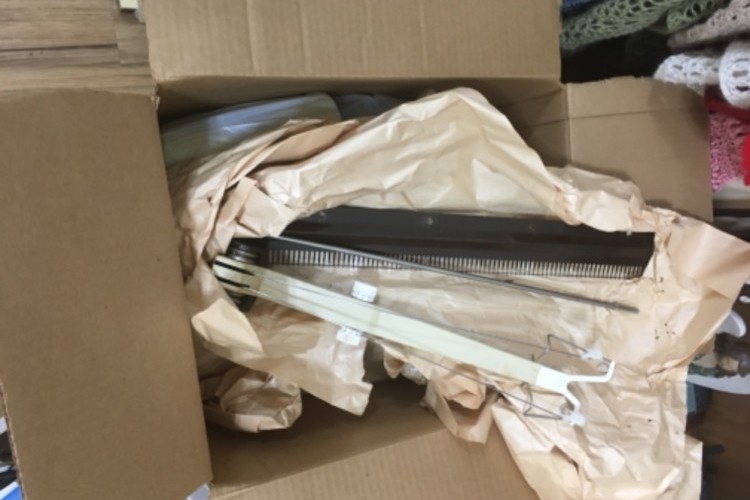Box full of accessories, parts and pieces Box full of accessories, parts and pieces