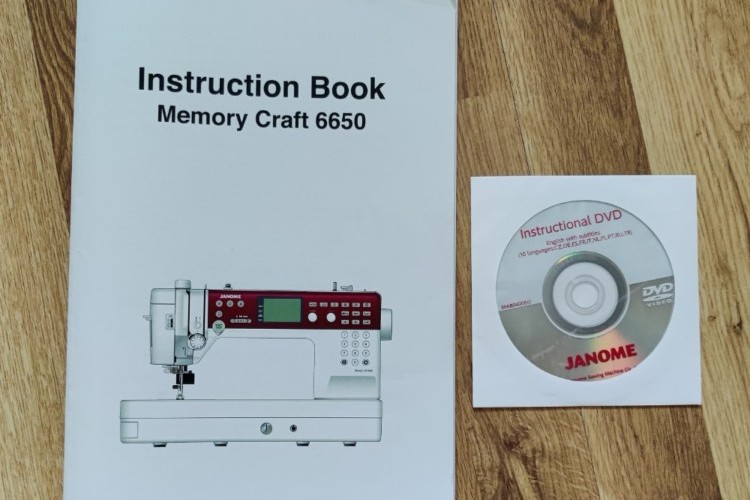 SEWING MACHINE MANUAL AND DVD